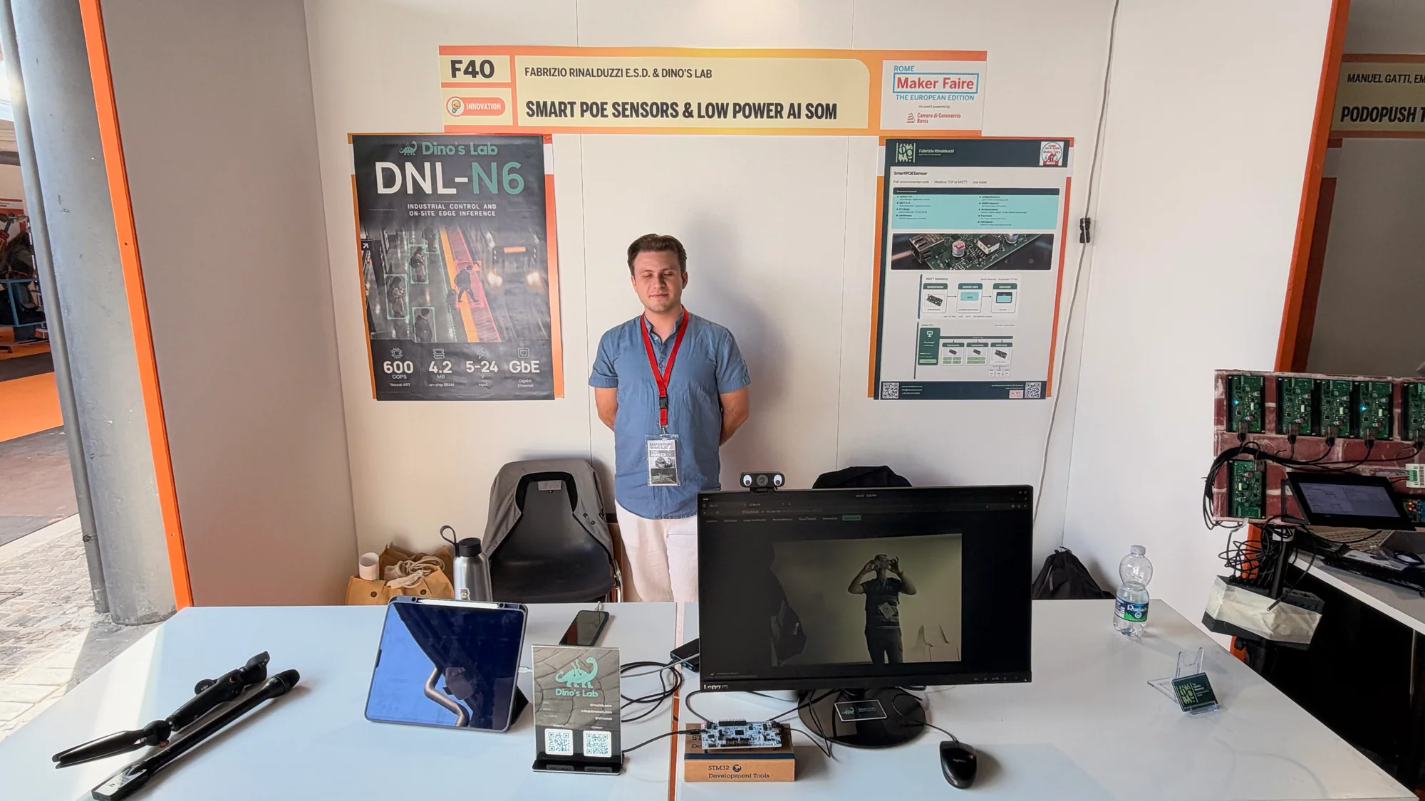 Dino's Lab stand with DNL-N6 and Smart PoE Sensor posters