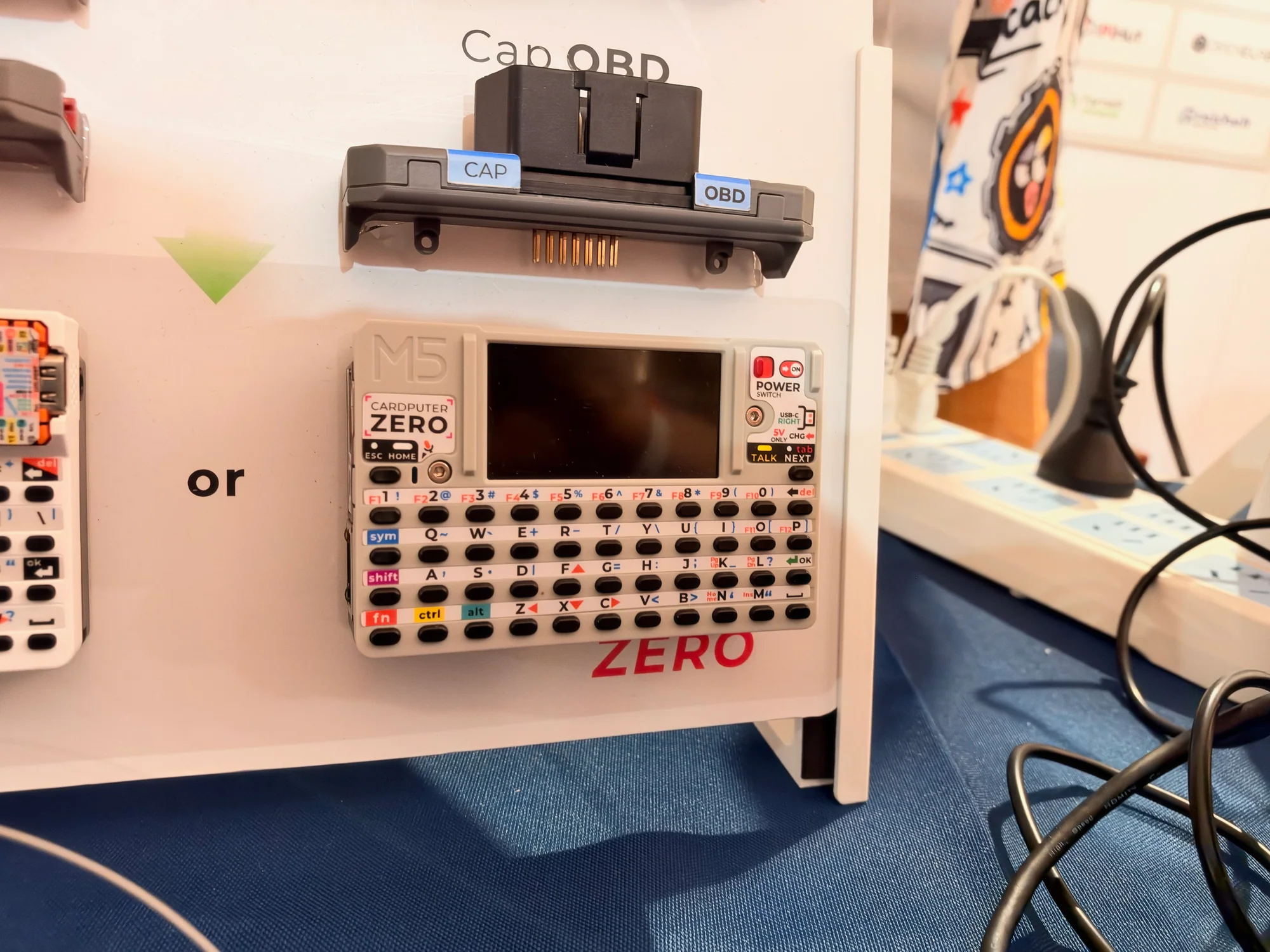 M5Stack Cardputer ZERO displayed below a Cap OBD expansion module