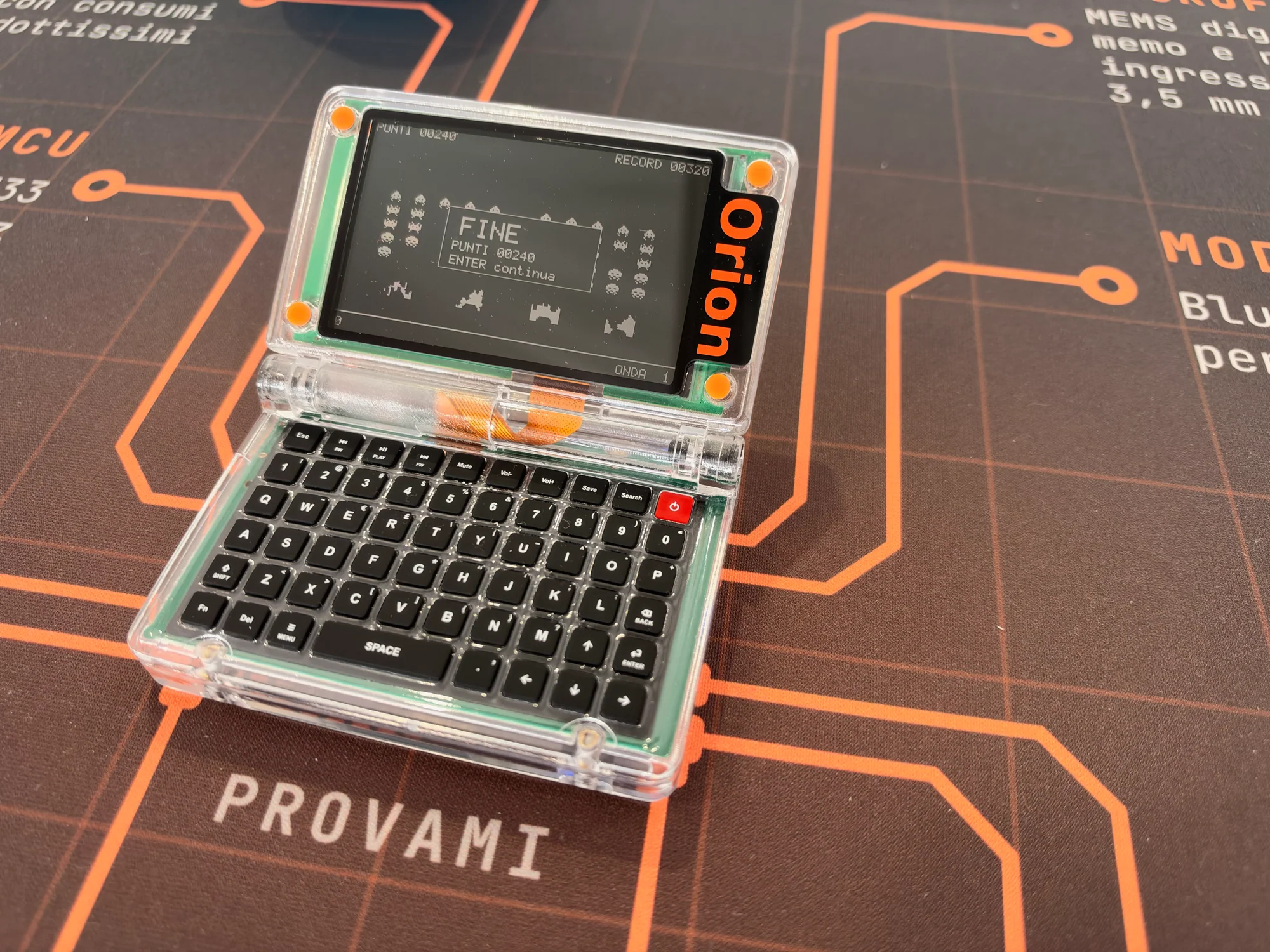 Orion clamshell personal digital assistant with a physical keyboard and monochrome display