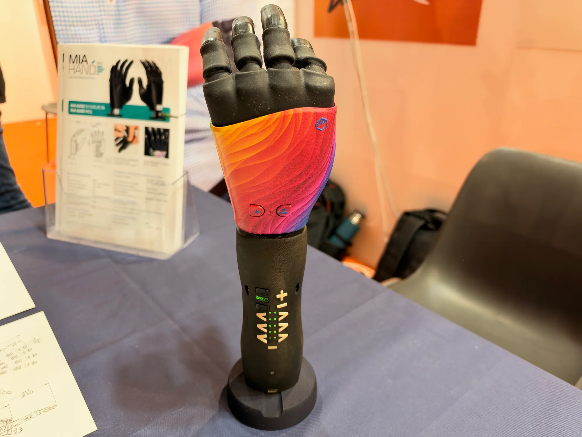 Prensilia MIA Hand and forearm assembly on a display stand