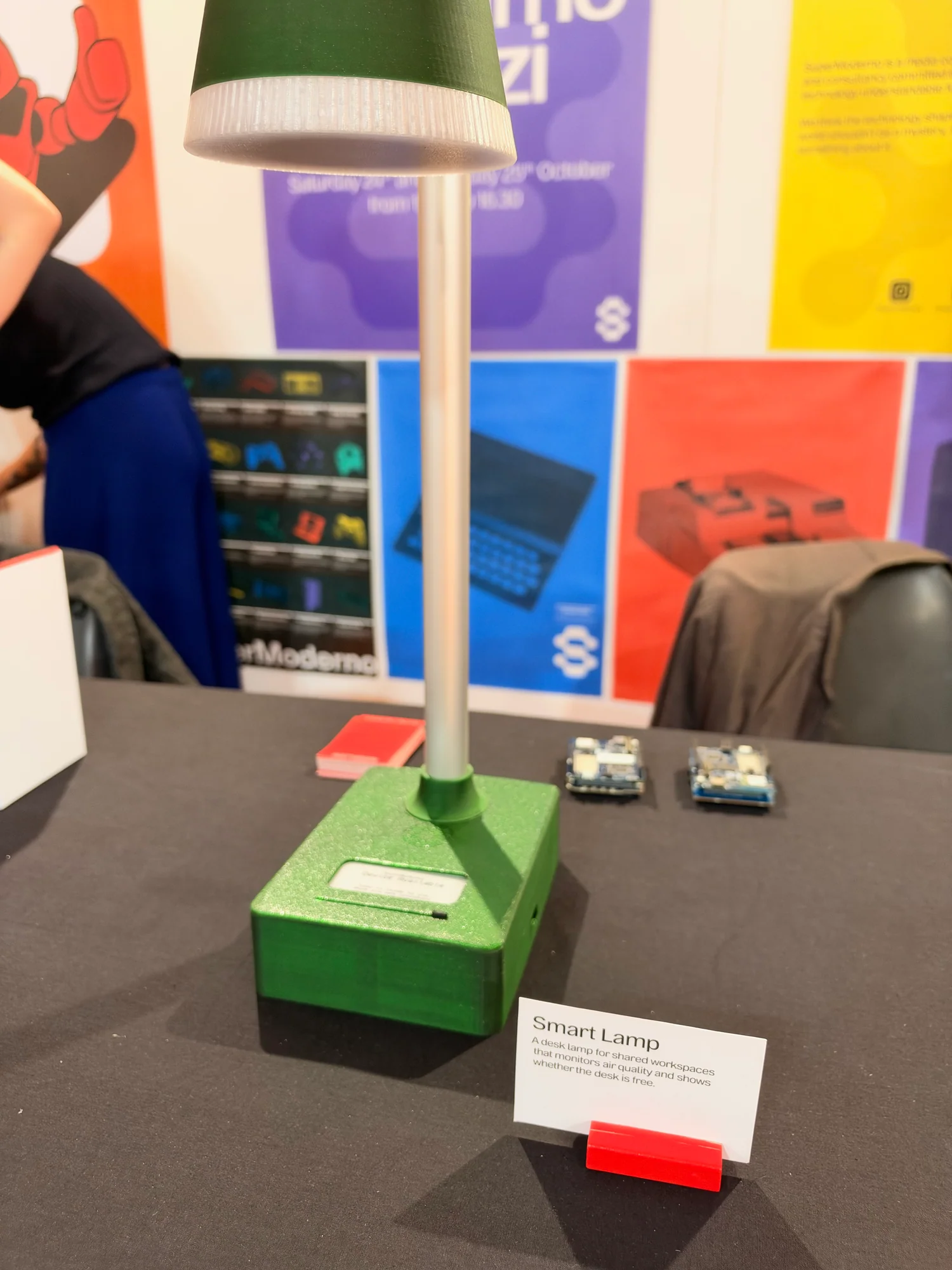 Green Smart Lamp prototype with a display in its base