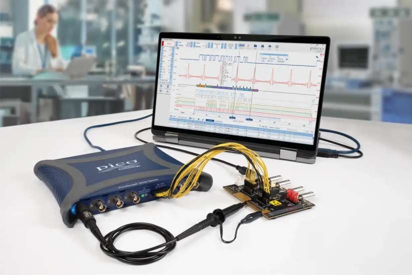 PicoScope 3000E MSO connected to a laptop and demonstration board with analog probes and digital leads