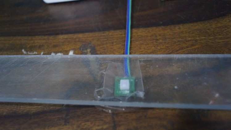 Sensor attached to a Glass surface