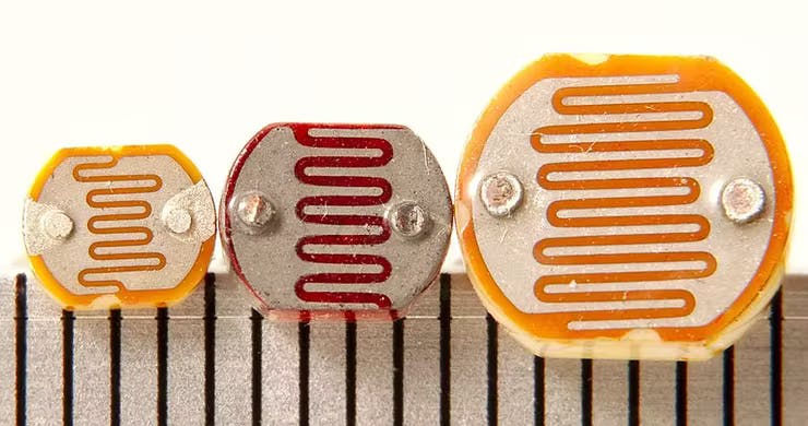 Three photoresistors with scale in mm