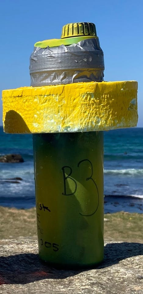 Assembled and sealed up buoy, spray-painted so that it is easier to spot in the ocean.